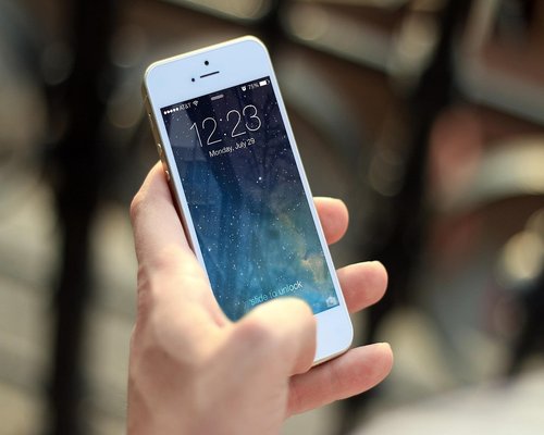 Smartphone screens showing fictional games